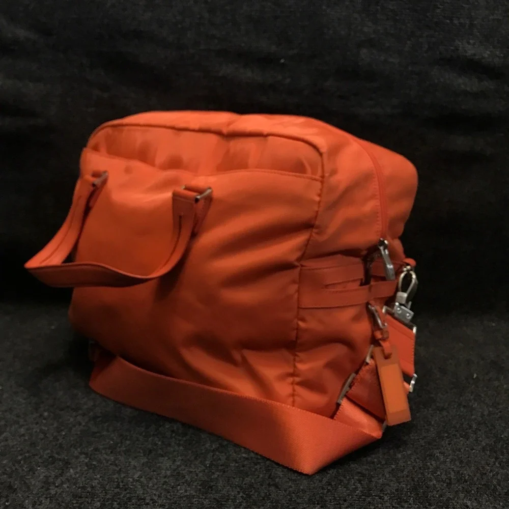 Tumi Model 4892MLN Voyageur Tangerine Nylon Weekender Travel Shoulder Duffel Bag